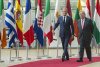 EU, UN, Donald Tusk, Antonio Guterres, flags