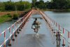 shutterstock_64806940_ bike, flood, bridge