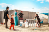 Women and children collecting water at IDP camp
